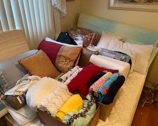 Lots of great bedding, temper-pedic pillows, mattress topper, GREAT blankets