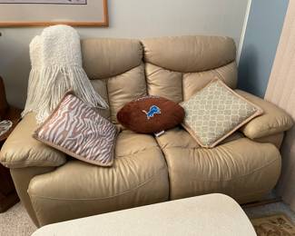 Like new cream leather reclining two seat LAZY BOY Length is 68"  it's SO COMFORTABLE! (Go Lions!)