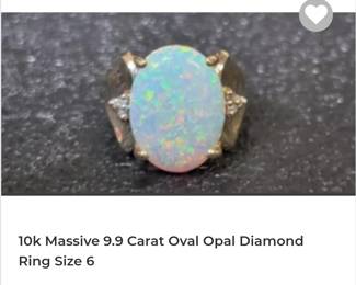 10k 9 carat oval opal ring
