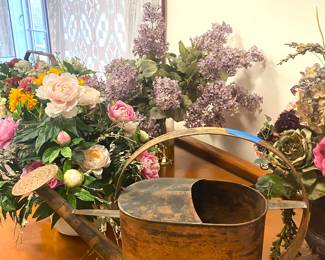Dried and silk flower arrangements/copper watering can