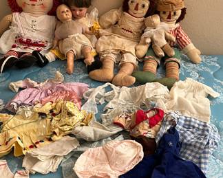 Lot of old vintage dolls and doll clothes