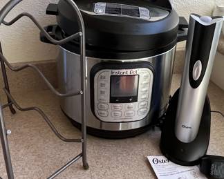 Insta pot, wine rack and oster cork remover 