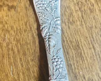 Tiffany and Company solid Sterling Silver Serving Spoon with gold wash. Berries and vines pattern 