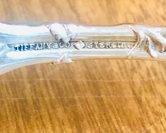 Tiffany and Company solid Sterling Silver Serving Spoon with gold wash. Berries and vines pattern 