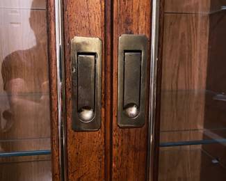 Glass Front Pocket Pulls Lighted Cabinet