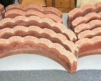 LOT OF 17 LARGE LANDSCAPING BORDER BRICKS.