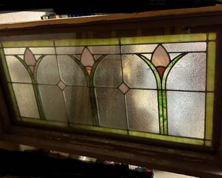 Stained Glass Window it is in a cased between pieces of glass. it measures 4X2. See photos for condition. $175.00