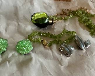 Earrings, Bracelet and Green bottle necklace with something in it, perfume? $15.00