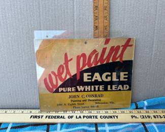 Wet Paint Eagle pure White Lead Sign, has a chip out of the corner $12.00