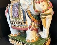 Enticing Elephant Painted Stand / Stool that measures 19 x 20 x 10. There is some wear including a couple of chips