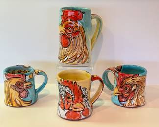 Karin Kraemer Rooster Pottery Mugs

Three measuring four inches and one measuring six inches. All in very good condition. 

