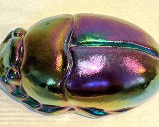 Artisan Hand Blown Iridescent Scarab Figurine, measuring about 4.75" x 2" 

Signed by the artist. 