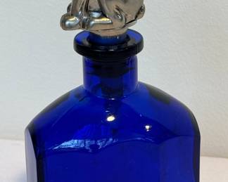 Cobalt Blue Bottle with Bulldog Figurine Stopper making for a wonderful combination! 

Measures about 9 inches tall. 
