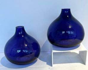 Two Pretty Purple Glass Vases, each measures 5 inches tall. Light wear. 