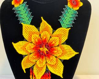 Bright and Colorful Beaded Necklace and Bracelet Set, likely purchased in Mexico

The necklace measures about 32" with the bracket measuring 7.5" 