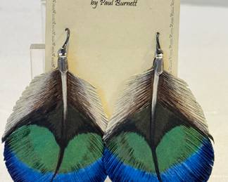 Hand Crafted Leather Feather Design Earrings by Paul Burnett, New. 

Measuring about 2.25" long. 

Designed to resemble the feathers of a peacock breast. The craftsmanship is amazing! 
