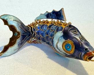 Articulated Enamel Fish Pendant, measuring four inches long. 