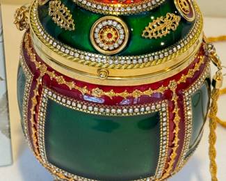 Vivian Alexander Hunter Green Jeweled Egg Evening Bag, New. Comes with a gold colored 48 inch strap and a coin pouch with an adorable egg shaped zipper pull. 

Retired. Circa 1990's 