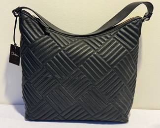 New with Tags, Cole Haan Black Avery Hobo Quilt II

Shows some light surface wear/marks. Measures about 12" x 3.5" x 12" 