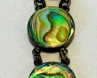 Vintage Mother of Pearl Watch Fob, measuring about four inches long 