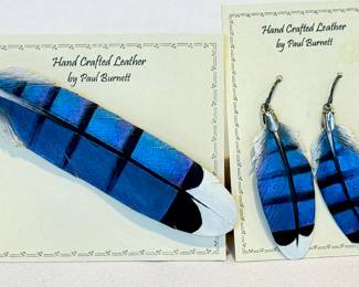 Paul Burnett Hand Crafted Leather Brooch and Earrings Set, New. 

Gorgeous set designed to resemble the feathers of a blue jay. The craftsmanship is amazing! 