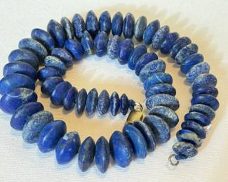 Lapis Stone Beaded Necklace, measuring 16 inches long. 
