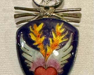 Artisan Sterling and Enamel Pendant in a beautiful design and measuring two inches.

Signed, EC