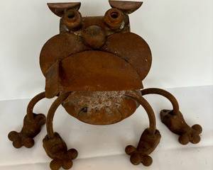 Metal Bulldog Decorative Figurine, measures 17 x 12 x 8 inches. There is wear consistent including rust which provides a great patina with being displayed outdoors. Cute yard decor! 