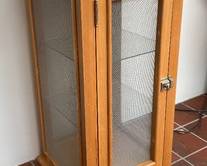 Delightful! This Wooden Cabinet with Screened Sides and Glass Shelves measures 15 x 15 x 29 inches. Some light wear. 
