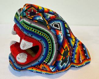 Huichol jaguar head, Huichol Decor, Huichol beadwork, Mexican Art, Collectible Figure, measures about 7" h x 8" w 

In very good condition, item may be missing some beads, not overly noticeable.