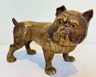 Antique Cast Iron Hubley Bulldog Bank, measuring about 8.5" x 6.75"

Item in used/antique condition with wear including paint loss which can be viewed in the photo gallery. 