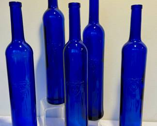 Five Decorative Cobalt Blue Tall Glass Bottles, each measuring just under 17 inches. 