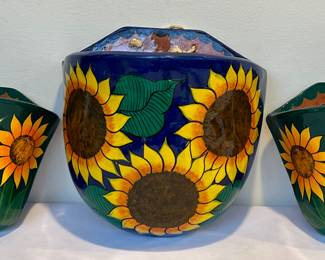 Set of Three Hand Painted Mexican Pottery Wall Planters

Two measure about 7.6 inches and one measures 10 inches 