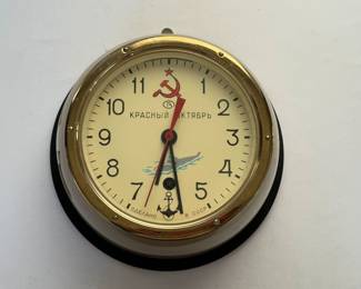 Vintage Russian Wall Clock, measuring nine inches wide. 

No key is included. The working condition is not known. 