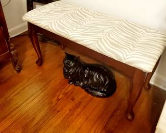 Porcelain cat, bedroom bench 