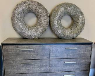 There are two of these gray-tone 6 drawer dressers by Lane