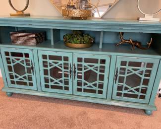 Turquoise colored credenza