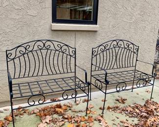 matching pair of metal benches