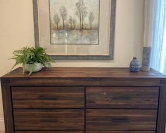 There are 2 of these 6 drawer dressers