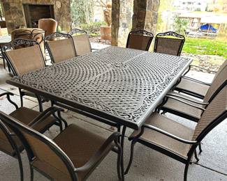 Outdoor dining table with 10 chairs