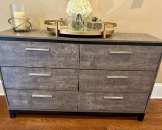 There are two of these gray 6 drawer dressers by Lane