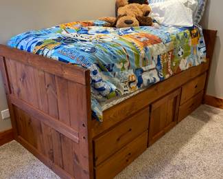 Set of 2.  Solid wood beds with 4 storage drawers and secret hideout fort.  Comes with matching desks.