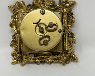 Additional view of the back of Stylebuilt gold ornate clock~
