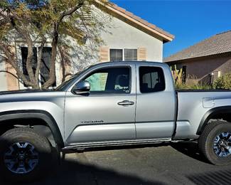 2016 Toyota Tacoma Truck for sale. 4-wheel drive, new tires, bed cover, 45,000 miles, one elderly owner, no accidents, no scratches, no dents, always detailed, only one person, the owner ever rode in the vehicle, We are taking bids starting Thursday at 8m until Saturday.