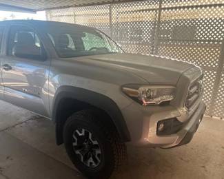 2016 Toyota Tacoma Truck for sale. 4-wheel drive, new tires, bed cover, 45,000 miles, one elderly owner, no accidents, no scratches, no dents, always detailed, only one person, the owner ever rode in the vehicle, We are taking bids starting Thursday at 8m until Saturday.