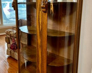Oak bow front curio cabinet