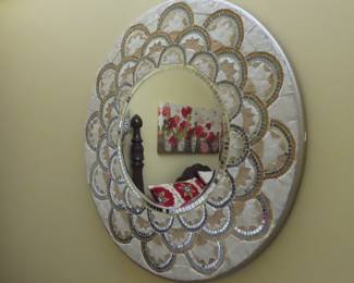 Round mosaic mirror.
