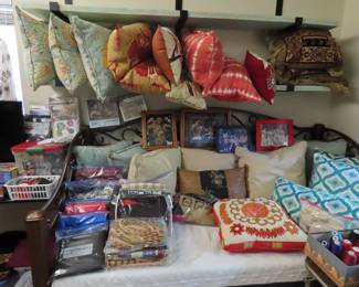 Throw pillows galore, packs of fabric.