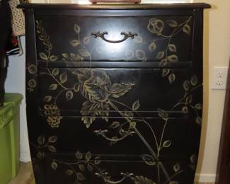 Four drawer decorative chest.