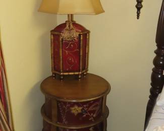 Three draw round end table and table lamp.